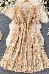 Robe longue à imprimé floral, ourlet à volants et fente haute